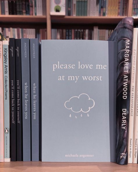 light blue book on a shelf, titled “please love me at my worst” with a rainy cloud underneath Please Love Me At My Worst Book, Love Me At My Worst, At My Worst, Please Love Me, Book Library, Margaret Atwood, Library Books, Book Shelf, Blue Aesthetic