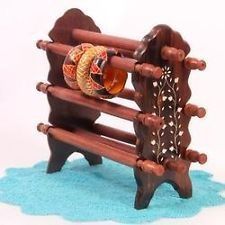 Handcrafted wooden bangle stand. Bangle Stand, Indian Handicrafts, Wooden Bangle, Diy Furniture Easy, Gold Ornaments, Wood Products, Wine Rack, Diy Furniture, Boats