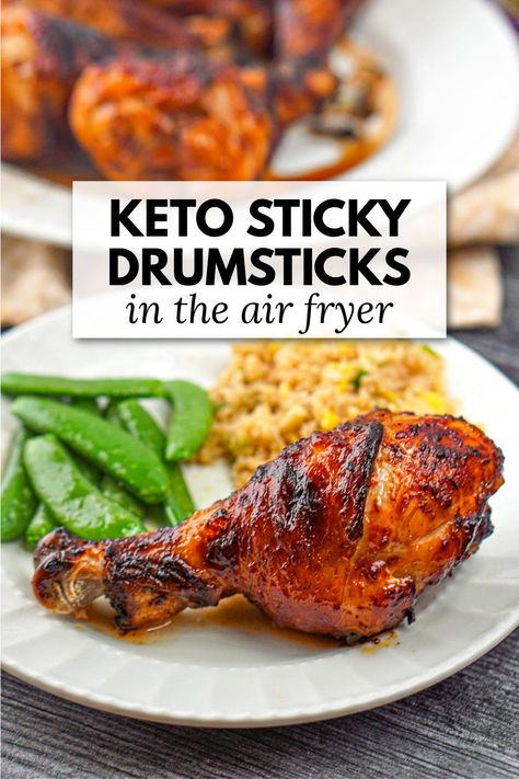 white plate with sticky air fryer drumstick, snap peas and text