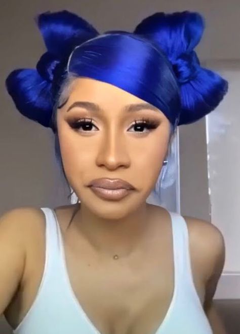 Cardi b hairstyles are one of the most talking points of her styling appearances. As she is a top celebrity face of the Hollywood industry, she made her positive impressions with some appealing styles and outfits. Fans follow her different types of hairstyles. Let’s talk about some of her lovely hairstyles now.     What Is the … 12 Best Cardi b Hairstyles Over the Years Read More » Cardi B Bun Hairstyle, Cardi B Blue Hair, Cardi B Wig Hairstyles, Two Bow Buns Hairstyle, Cardi B Bow Hairstyle, Cardi B Wigs, Bow Buns Hairstyle, Wig In A Bun, Cardi B Makeup