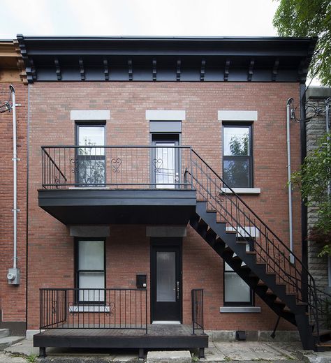 Traditional brick facade of Montreal renovation by Blouin Tardif. Duplex Renovation, Duplex Facade, Red Brick Townhouse Exterior, Painted Brick Apartment Building, Modern Brick Townhouse, Brick Duplex Exterior, Brick Row House, Staircase Outdoor, Exterior Stairs