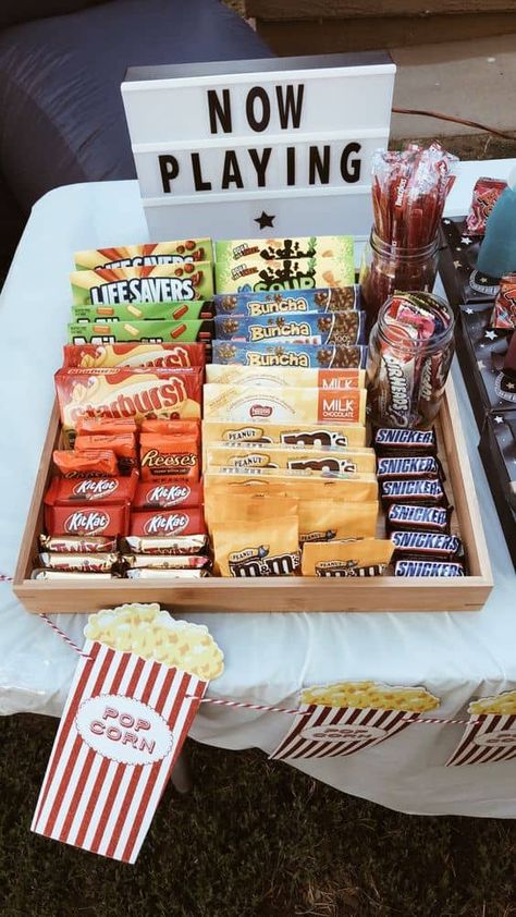 How to Throw a Taylor Swift Birthday Party for Kids (Eras Tour) - One Sweet Nursery 13 Birthday Movie Night, Movie Party Snack Ideas, Outside Movie Night Food Ideas, Outdoor Movie Snack Ideas, Deck Movie Night, Sweet 16 Outdoor Movie Party, Movie Night Sweet 16, Movie Party Ideas For Adults, Movie Theme Birthday Party Food