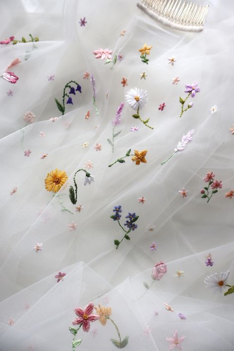 A close up image of an ivory wedding veil with colourful wildflowers Pastel Inspiration, Wedding Veil Colorful, Flower Veil Wedding, Wildflower Veil, Embroidered Wedding Veil, Flower Embroidered Veil, Embroidery Flower Vail, Wedding Dress With Flowers, Embroidered Veil