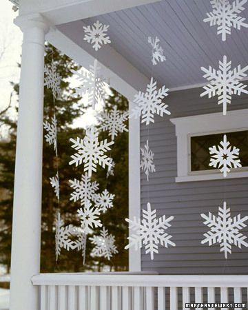 Frosty Banners  Although these oversize snowflake streamers look delicate, they're made from a sturdy material that allows them to withstand wet weather. Simple Holiday Decor, Homemade Christmas Decorations, Christmas Tablescape, Christmas Decorations Diy Outdoor, Snowflake Decorations, Christmas Porch, Simple Holidays, Noel Christmas, Christmas Door