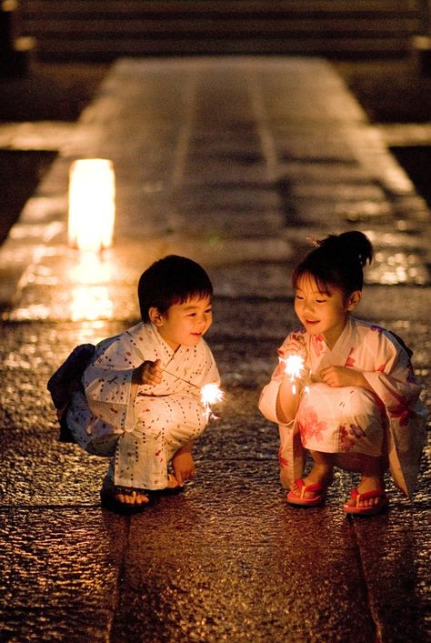 .fireglow. Little boy and girl smiling at their sparklers at night. Cool Baby, Kyushu, Maneki Neko, People Of The World, 인물 사진, Japanese Culture, Little People, People Around The World, Beautiful World