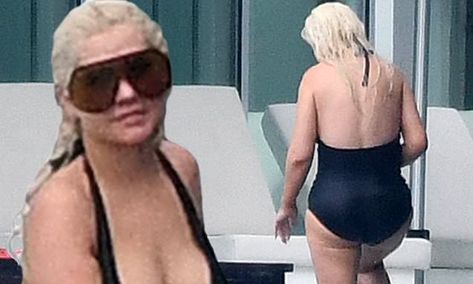 Christina Aguilera, 40, takes the plunge in a VERY low-cut swimsuit Christina Aguilera Swimsuit, Christina Aguilera Hair, Low Cut Swimsuit, Perfect Waves, Huda Kattan, Genie In A Bottle, Terry Robe, Hair Curling Tips, Plunge Swimsuit