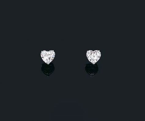 A PAIR OF DIAMOND EAR STUDS Price realised HKD 1,614,100 Estimate HKD 1,150,000 - HKD 1,240,000 Closed:  29 Apr 2002 Each set with a heart-shaped diamond weighing 3.26 and 3.58 carats, mounted in platinum Heart Shaped Diamond Earrings, Diamond Ear Studs, Heart Diamond Earrings, Diamond Heart Earrings, Luxurious Lifestyle, Heart Chain, Heart Shaped Earrings, Heart Shaped Diamond, Body Chain Jewelry