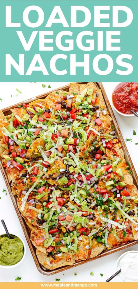 Say goodbye to boring old nachos and hello to these loaded veggie nachos! With layers upon layers of colorful veggies and ooey-gooey cheese, these vegetarian sheet pan nachos are guaranteed to be a crowd pleaser. Ready in under 30 minutes and can be served as an appetizer, snack or full meal. Perfect for Game Day, Cinco De Mayo, movie night or a fun and easy weeknight dinner! | www.mapleandmango.com Veggie Nachos Recipe, Vegetarian Sheet Pan, Veggie Nachos, Sheet Pan Nachos, Pan Nachos, Cheesy Nachos, Colorful Veggies, Homemade Nachos, Green Snacks