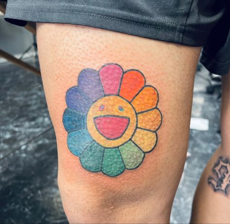 Murakami flower tattoo Spongebob Flower Tattoo Coi Leray, Smiley Face Flower Tattoo, Kaws Flower Tattoo, Murakami Tattoo Ideas, Smiley Flower Tattoo, Takashi Murakami Flower Tattoo, Takashi Murakami Tattoo, Murakami Flower Tattoo, Cartoon Flower Tattoo