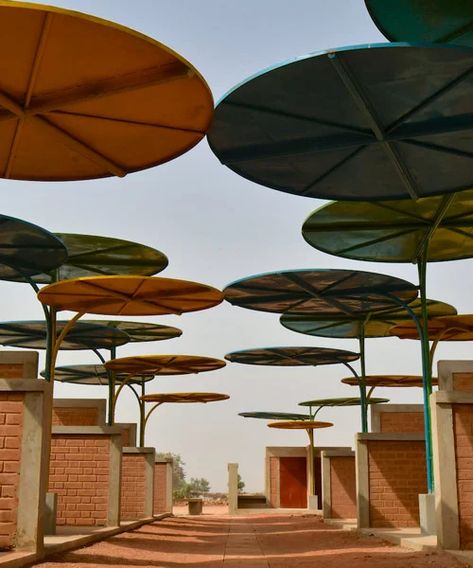 atelier masomi uses colorful metal canopies to build dandaji market in niger Desert Climate, Best Architecture, Big Building, Traditional Market, French Colonial, Canopy Design, Metal Canopy, Natural Ventilation, Co Design