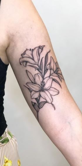 Wild Lily Tattoo, Catalilly Flower Tattoo, A Lily Tattoo, Lily Bicep Tattoo, Bouquet Of Lilies Tattoo, Lilies And Roses Tattoo, Moon Lily Tattoo, Lilly Tattoo Arm, Big Lily Tattoo