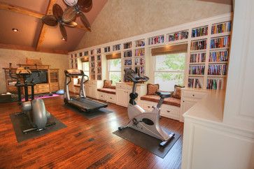 I don't like the design of this room, but I do like the concept of a library/home gym room with window seats. Library And Gym Room, Gym Design Ideas, Home Gym Layout, Basement Home Gym, Building A Home Gym, Dream Home Gym, Tiny Loft, Library Home, Enclosed Porch