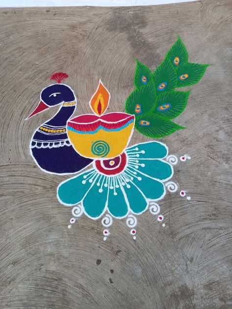 Peacock And Diya Rangoli, Rangoli In Front Of Door, Best Rangoli Designs Diwali Peacock, Rangoli Designs Peacock Easy, Simple Peacock Rangoli Designs Easy, Peacock Rangoli Easy, Pecock Model Rangoli, Peacock Rangoli Designs Beautiful, Rangoli Peacock Design