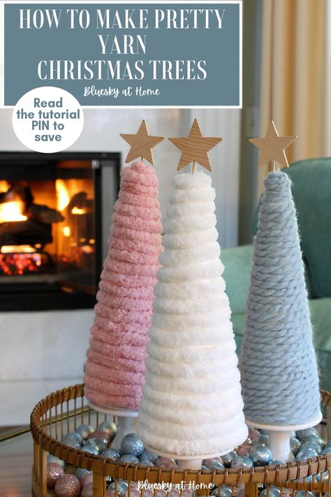 How to Make the Prettiest DIY Yarn Christmas Trees. Using yarn is an easy way to add a festive look to your holiday home decorations. Customize this project with different colors, sizes, and embellishments. Easy and fun Christmas project you will love. Yarn Wrapped Christmas Tree Diy, How To Make Giant Christmas Ornaments, Diy Christmas Tree Centerpiece, Diy Foam Christmas Tree, Diy Cone Trees Christmas, Christmas Tree Yarn Craft, Yarn Trees Christmas Diy, Tulle Christmas Trees Diy, Styrofoam Trees Christmas Diy