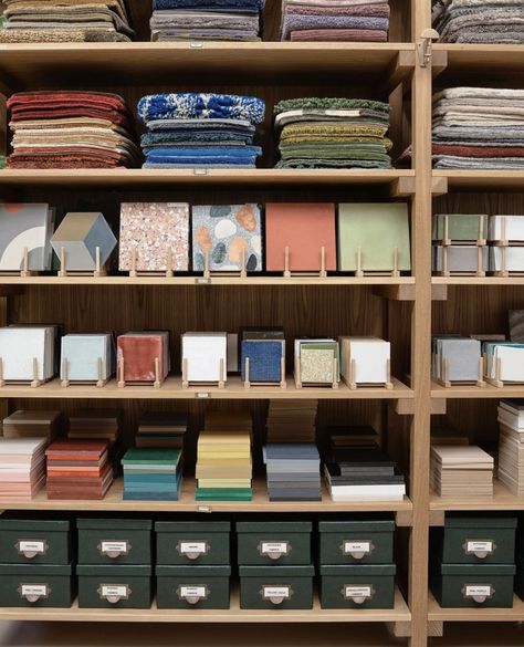 Flooring Showroom, Flack Studio, Vintage Leather Chairs, Design Studio Office, Library Organization, Polished Plaster, Credenza Design, Material Library, Studio Organization