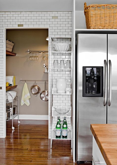 kitchen-rack-near-fridge-subway-tile-69fd85f1 Baskets Above Fridge, Above Fridge, Pegboard Kitchen, Decorating Above Kitchen Cabinets, Budget Remodel, Kitchen Storage Space, Small Kitchen Decor, Small Space Solutions, Pantry Design