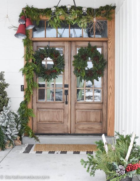 How do you embellish your home exterior during the holidays? By adding a Christmas tree to your front porch! Decorated Front Porch, Porch Garland, Christmas Front Porch, Christmas Front Doors, Christmas Porch Decor, Front Porch Christmas Decor, Christmas Porch, Farmhouse Christmas Decor, Noel Christmas