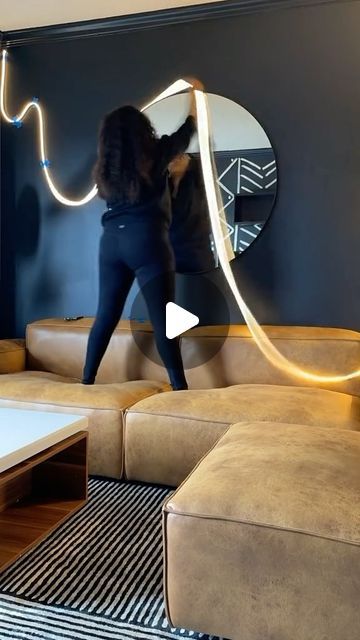 S A N D Y - Atlanta Interior Designer on Instagram: "This rope light is linked in my bio 🤗  BTW, this is an old DIY from 2022. I've also used this light in my crown molding. Safe to say I still like this light 🥰  #ledropelight #ledlights #striplights #ledstriplights #livingroomdecor" Diy Indirect Lighting, Neon Lights In Living Room, Diy Crown Molding With Led Lights, Diy Led Strip Lighting Ideas, Govee Lights Ideas, Rope Lights Living Room, Govee Neon Rope Idea, Led Tube Lighting Ideas, Led Lights On Wall