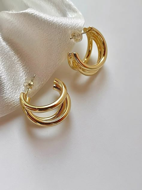 Consider these gold hoops to be a triple axel. They're ready to take center ice with equal parts huggies and hoops. Gold-Plated Hoops Sterling Silver Posts Minimalist Style 16mm Diameter