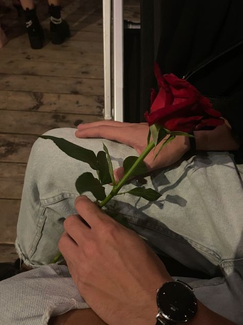 Man With Roses In Hand Aesthetic, Rose Giving Hand Couple, Man Holding Flowers Aesthetic, Red Guy Aesthetic, 2024 Relationship, She Loves Me Musical, Asher Scott, Rose Day Pic, Flowers Pose