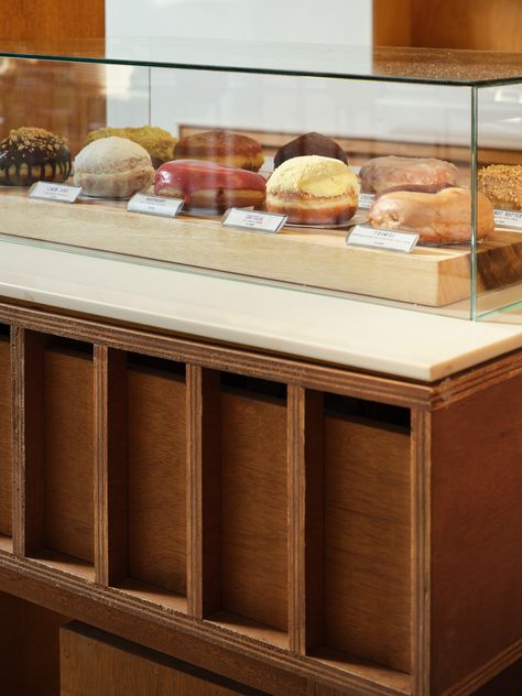 Gallery of Old Ferry Donut Café / Studio GIMGEOSIL - 10 Cafe Counter Display, Bakery Display Counter, Bakery Cafe Interior, Cafe Counter Design, Bakery Showcase, Bakery Counter, Coffee Shop Counter, Modern Bakery, Classical Interior Design