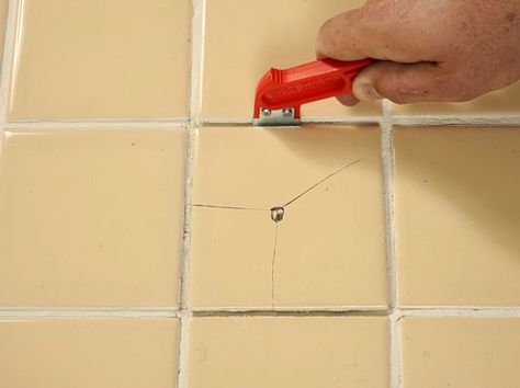 Replace broken or missing ceramic tiles to prevent further damage. Damaged tiles allow moisture to get under the tile, so replace broken ceramic tiles right away. Ditto for clay tiles! You can easily replace cracked and broken ceramic and clay tiles if you kept extra tiles and grout mix. If not, you’ll need to either … Cracked Tile Repair, Tile Around Tub, Tile In Bathroom, Grout Repair, Tile Repair, Tile Removal, Bathtub Tile, Ceramic Floor Tile, Tile Countertops