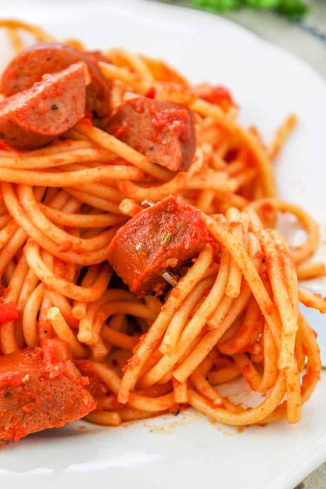 Spicy sausage spaghetti is a cheap meal that is family friendly. Use kielbasa, ground, brats or Italian sausage in homemade sauce and pasta. Ninja Foodi Spaghetti, Spaghetti With Sausage, Noodles And Cheese, Cajun Sausage, Sausage Spaghetti, Cheap Meal, Mild Italian Sausage, Spaghetti Recipe, Spicy Sausage