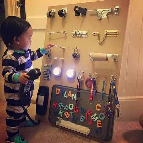 what an awesome idea for kids! I wish I'd have thought of it when my kids were still this little! Dang! Toddler Activity Board, Busy Boards For Toddlers, Sensory Boards, Cool Baby, Homemade Toys, Activity Board, Busy Board, Busy Toddler, Baby Diy