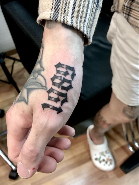 1989 gothic font tattoo (scar cover up)done by Jon Koon at Artistic studio hair and tattoo Singapore Gangsta Font Tattoo, 1989 Tattoo Ideas, Gothic Writing Tattoo, Gothic Font Tattoo, 1989 Tattoo, Tattoo Scar Cover, Old English Font Tattoo, Tattoo Scar, Old English Tattoo