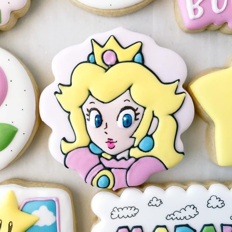 Can you hear the music?🎵🎶 I used to play a lot of Super Mario as a kid, so this set had me feeling some serious nostalgia. 😄 I loved… | Instagram Princess Peach Cookies Decorated, Princess Peach Cookies, Super Mario Cookies, Peach Cookies Recipe, Mario Cookies, Peach Cookies, Kitten Party, Princesa Peach, Mario Birthday