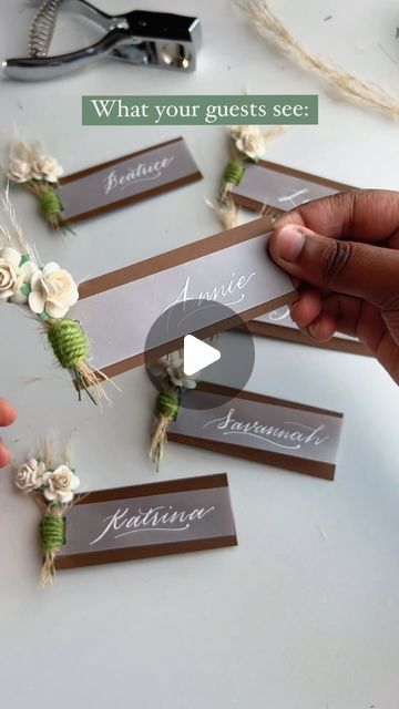 New Jersey Wedding/Event Calligraphy + Signage on Instagram: "Perfect placecards for a Boho or Rustic Chic event🤍 These calligraphy place cards cater to the natural, genuine aesthetic of the bohemian or rustic (might I even say farmhouse) decor, with a touch of sophistication elevating its overall appearance. No matter the theme, we can achieve your desired look with the change of color palettes, flower choice, and binding material. Save this for inspo later! #eventplacecards #weddingtablesetting #weddingtabledecor #bohobirthday #rusticwedding flower place cards, pretty place cards, calligraphy place cards, boho chic event decor, boho chic baby shower, diy boho event decorations, #modernrusticdecor rustic wedding ideas boho graduation ideas, modern rustic wedding, vellum placecards" Genuine Aesthetic, Unique Place Cards Wedding, Diy Wedding Place Cards, Wedding Vellum, Boho Event, Flower Place Cards, Boho Graduation, Wedding Ideas Boho, Flower Place