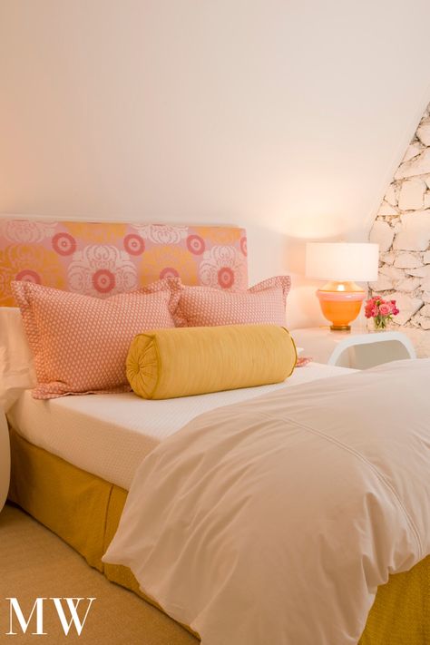 This colorful Washington DC guest room features a fun floral headboard with orange and pink alongside yellow and peach accents. Designed by Massucco Warner. #colorful #designinspo #flowers #headboardideas #happy #decor #warm #color Pink Orange Grey Bedroom, Pink Orange And Yellow Boho Bedroom, Pink Orange Room, Pink And Yellow Bedroom Ideas, Bedroom With Yellow Accents, Orange And Pink Bedroom, Yellow And Pink Bedroom, Colorful Guest Bedroom, Pink Guest Bedroom