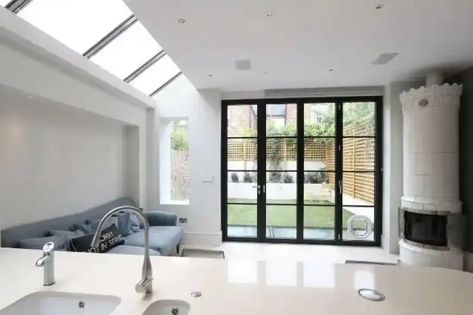 contemporary kitchen extension with modern and minimal design and a black steel look aluminium bifold patio door Bifold Windows, Aluminium Bifold Doors, Crittall Windows, Bifolding Doors, Monochrome Kitchen, Bifold Door, Bi Fold Door, Cat Flap, Saint Andrews