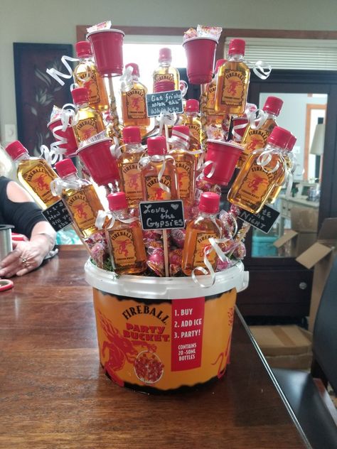 Fireball Gift Basket, Gift Basket Homemade, Alcohol Basket, Raffle Basket Ideas, Beer Bouquet, Alcohol Gift Baskets, Liquor Gift Baskets, Auction Gift Basket Ideas, Fundraiser Baskets