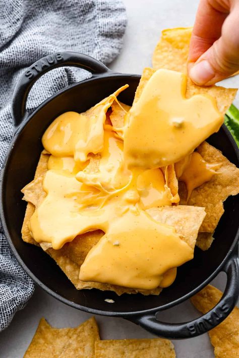 This Nacho Cheese recipe is the genuine Velveeta based topping that is full of nostalgia and amazing flavor! It's so simple to whip up and tastes way better than store-bought. Cheese For Nachos, Queso Appetizers, Nacho Cheese Recipe, Homemade Nacho Cheese, Ideas To Feed A Crowd, Homemade Nacho Cheese Sauce, Nachos Cheese Recipe, Nacho Sauce, Nachos Cheese Dip