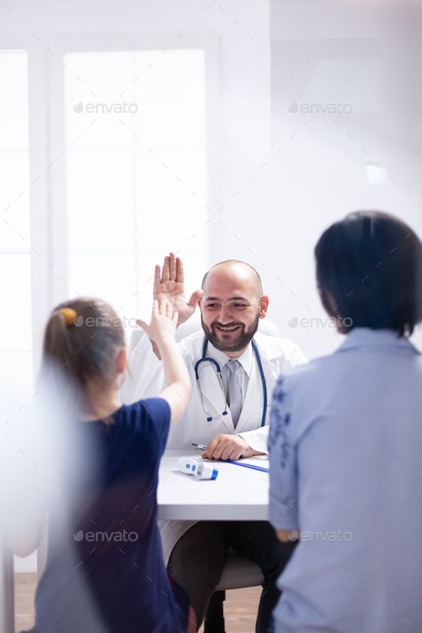 Doctor smiling at child by DC_Studio. Doctor smiling at child during consultation in hospital office. Healthcare physician specialist in medicine providing... #Sponsored #DC_Studio, #consultation, #hospital, #Doctor Surgeon Moodboard, Doctor Photoshoot Ideas, Medical Photoshoot, Clinic Photoshoot, Hospital Photoshoot, Pediatrics Doctor, Doctor Photo, Hospital Office, Doctor Images