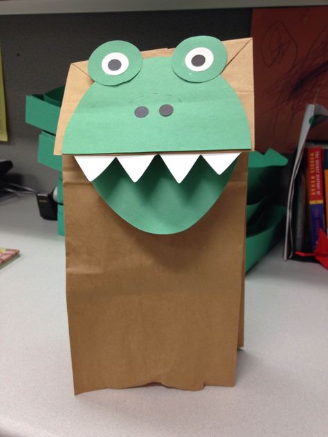 T-Rex puppet: -Egg die, cut in half for face - Two 2 in green circles, two 1 in white circles, 2 holly berries for eyes. -2 holly berries for nostrils - 4 white triangles for teeth - Brown paper bag Dinosaur Puppet Paper Bag, Dinosaur Paper Bag Puppet, Paper Bag Dinosaur, Dinosaurs Crafts, Paper Bag Template, Dino Craft, Dinosaur Theme Preschool, Dinosaur Puppet, Dinosaur Activities Preschool