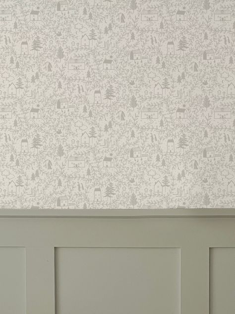 Cottages in the Woods Luxury Wallpaper is an intricate lineal hand illustrated design featuring whimsical cosy cottages surrounded by leafy foliage. Pairs beautifully with wall panelling. It also works as pretty cupboard or draw lining. • Printed to order in the UK on coated, non-woven traditional parchment wallpaper with a matte finish.• We recommend ordering a sample to check colours as they can vary on screens.• Please see below for more details and information on how to hang and care for you Nursery Woodland Wallpaper, Half Panel Half Wallpaper Nursery, Nursery In Small Bedroom, Cottage Wall Panelling, Wood And Wallpaper Accent Wall, Kids Room Wall Panelling, Nursery Accent Wall Wallpaper, Nursery Panelling And Wallpaper, Panelling And Wallpaper Bedroom