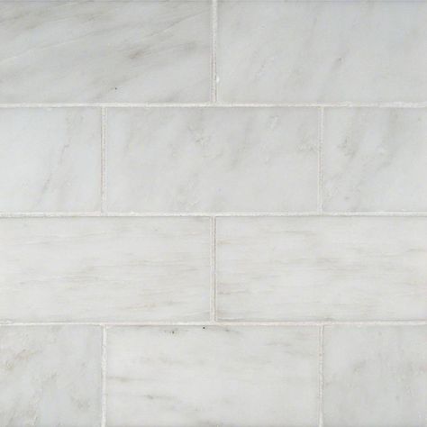 Marble backsplash tile in Arabescato Carrara 3x6 Honed and Beveled Tile is mostly white with light gray veins. The kitchen backsplash subway tile is also recommended for floors, countertops, and walls. Marble Tile Backsplash, Marble Subway Tiles, White Subway Tiles, Best Floor Tiles, Honed Marble, Marble Backsplash, White Subway Tile, Subway Tiles, Tile Wall