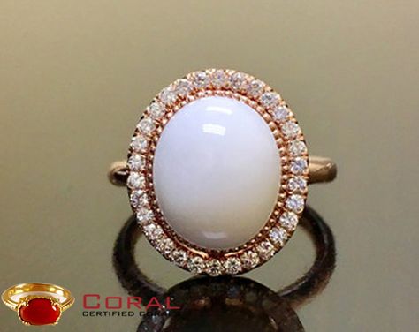 Studded with a gorgeous white #coral and surrounded with shiny #diamonds, this elegant #ring is sure to make a #style statement wherever you go! Coral Gemstone, White Coral, Hand Jewelry, Elegant Ring, A Style, Style Statement, Gold Jewelry Fashion, Red Coral, Opal Jewelry