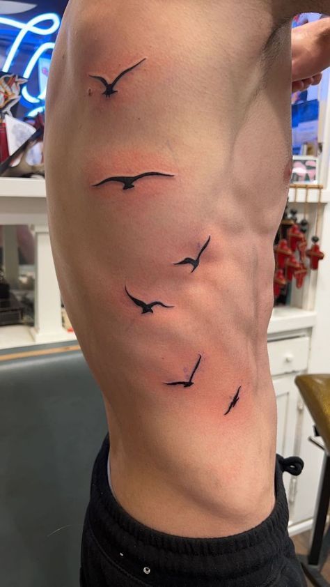 Guys Spine Tattoo, Mens Small Back Tattoo, Men’s Tattoo Back, Bird Back Tattoo Men, Men Tattoo Ideas Drawings, Small Upper Back Tattoo Men, Small Cover Up Tattoo Men, Men Torso Tattoo, Multiple Tattoos On Arm