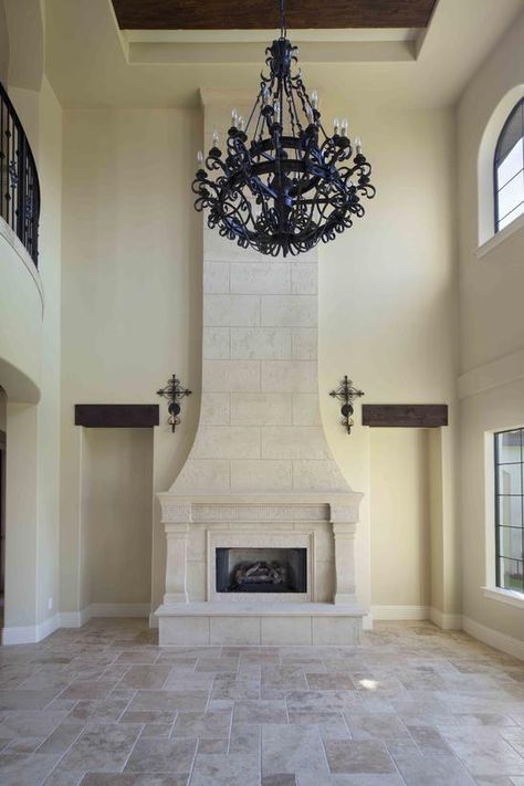 Mediterranean Living-rooms from Jorge Ulibarri on HGTV Travertine Fireplace, Tuscan Fireplace, Mediterranean Style Living Room, Mediterranean Living Rooms, Modern Tuscan, Living Space Ideas, Mediterranean Living Room, Mediterranean Living, Storage Inspiration