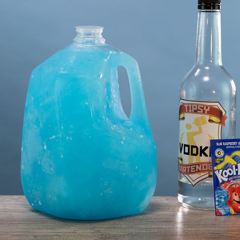 LAKE DAY PUNCH 25 oz. (750ml) Vodka 2 1/3 Cup Sugar 2 Packs Koolaid  Water Gallon Jug  PREPARATION 1. Add sugar, Kool Aid and vodka to a gallon container and shake well to mix. Add water and place in the freezer overnight. 2. Enjoy a slushee the following day! DRINK RESPONSIBLY!  (User Submitted by Dnice502 @ TipsyBartender.com) Lake Day Punch, Lake Drinks, Work Workouts, Vodka Recipes Drinks, 2024 Party, Punch Cocktails, Alcoholic Punch, Alcholic Drinks, Summer Drinks Alcohol