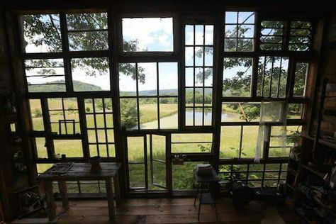 An entire wall made of old windows. I'm in love with this!! Old Wood Windows, Recycled Windows, West Virginia Mountains, Recycled Window, Glass Cabin, Wooden Cabin, Building A Cabin, Easy Build, Micro House