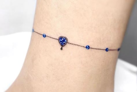 Tattoo Like Bracelet, Birthstone Anklet Tattoo, Infinity Anklet Tattoo, 3d Ankle Bracelet Tattoo, Friendship Bracelet Tattoo Design, Beautiful Ankle Tattoos For Women, Birthstone Tattoos For Women, Delicate Wrist Bracelet Tattoo, Ankle Tattoos For Women Anklet Ideas Charm Bracelets