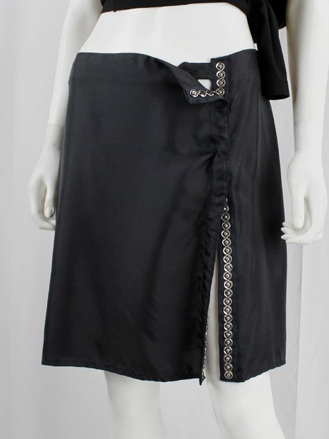 vintage Ann Demeulemeester black mini skirt with silver snap buttons along the full length spring 2001 (9) Ann Demeulemeester Aesthetic, 90s Ann Demeulemeester, Trashion Fashion, Ann Demeulemeester Runway, Ann Demeulemeester Archive, Ann Demeulemeester Skirt, Ann Demeulemeester 90s Campaign, Creative Sewing, Silk Shorts