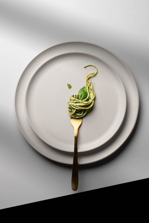 Pasta Pesto on a white matte plate. Minimalism, shadows, Gold fork. White table, Pasta Pesto Photography, Pasta Photography Food Styling, Minimal Ceramics, Food Aethstetic, Italian Food Photography, Christmas Food Photography, Restaurants In Amsterdam, Food Product Photography, Gold Fork