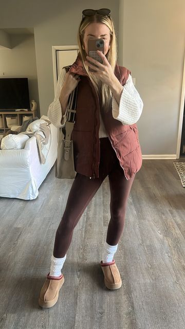 Charlotte Francesca on Instagram: "Layer up series, with my favorite burgundy leggings & oversized vest for fall 🍂🤍 the lululemon align leggings are my go to leggings, I’ve tried to find dupes on Amazon, but I always go back to buying the original aligns because they hold up so much better. I love this burgundy color (it’s called red merlot on their website), and it matches my ugg tazz slippers perfectly. I found this cropped mock neck sweater at Nordstrom rack and it’s less than $40, it’s so comfy & it’s perfect for laying for fall outfits. Tap the link in my bio or watch my stories for outfit details 🫶🏻 Follow @char_francesca on instagram for daily outfit inspo, find this outfit & all prior outfit details on https://tapto.shop/charlottefrancesca . . . . . Fall fashion | fall outfit i Maroon Puffer Vest Outfit, Platform Slippers Outfit, Fall Ugg Outfits, Burgundy Leggings Outfit, Socks Over Leggings, Ugg Tazz Slippers, Slipper Outfit, Tazz Slippers, Puffer Vest Outfit