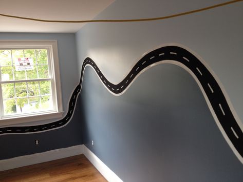 Hot Wheels Room Ideas Diy, Racetrack On Wall, Car Wall Design, Cars Themed Room Boys, Toddler Room Car Theme, Car Track On Wall, Boys Racecar Bedroom Ideas, Cars Theme Bedroom Boys, Car Themed Rooms For Boys