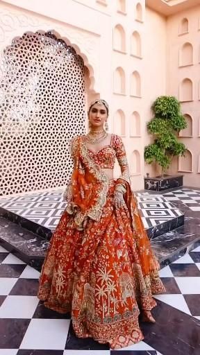 Red Orange Bridal Lehenga, Jago Bride Outfit, Bollywood Bridal Lehenga, Bridal Garba Outfit, Bridal Draping Styles, Phere Outfit For Bride, Rust Lehenga Bridal, Rajasthani Bride Lehenga, Marriage Lehenga Indian Bridal